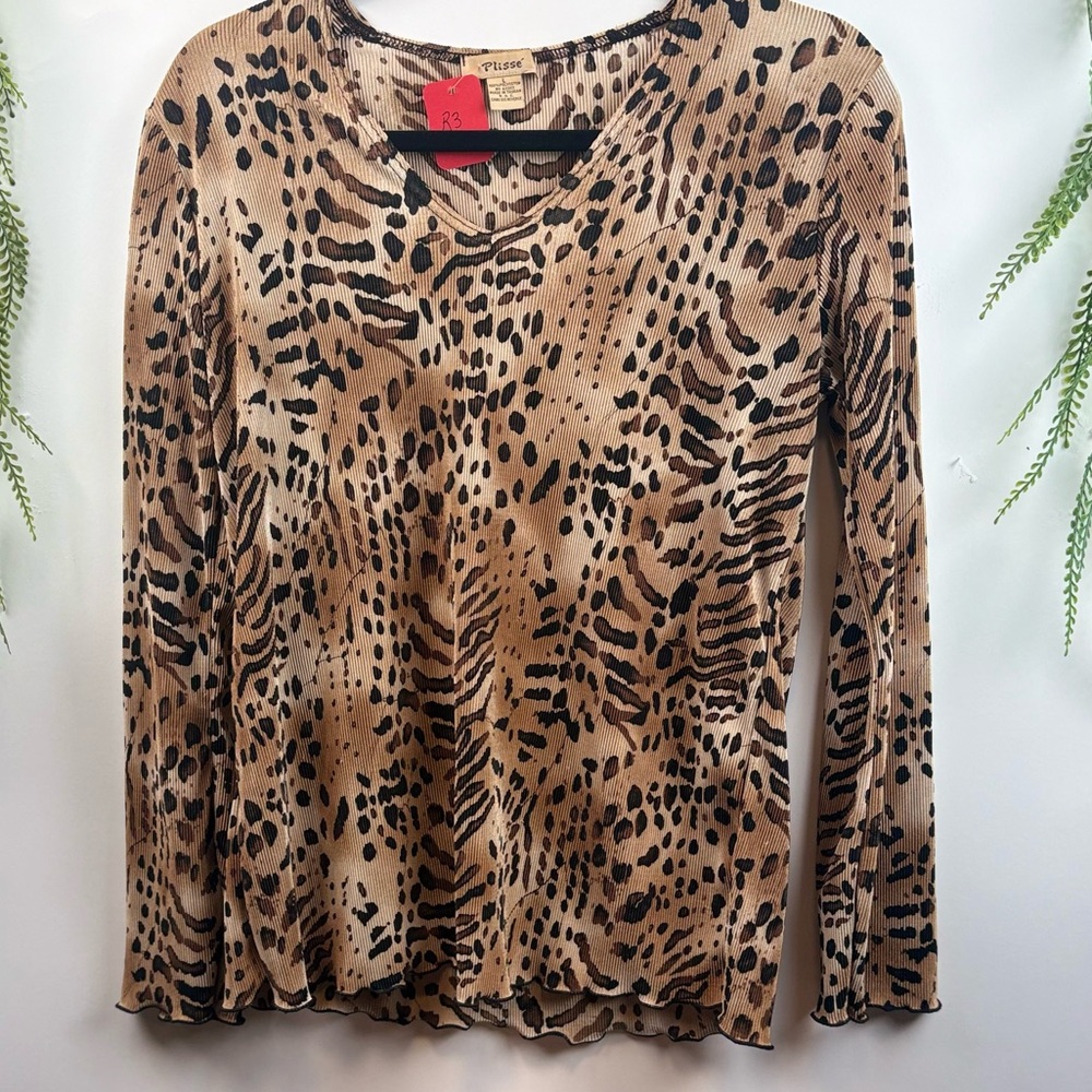 Plisse animal print blouse.  Lightweight material. Size large